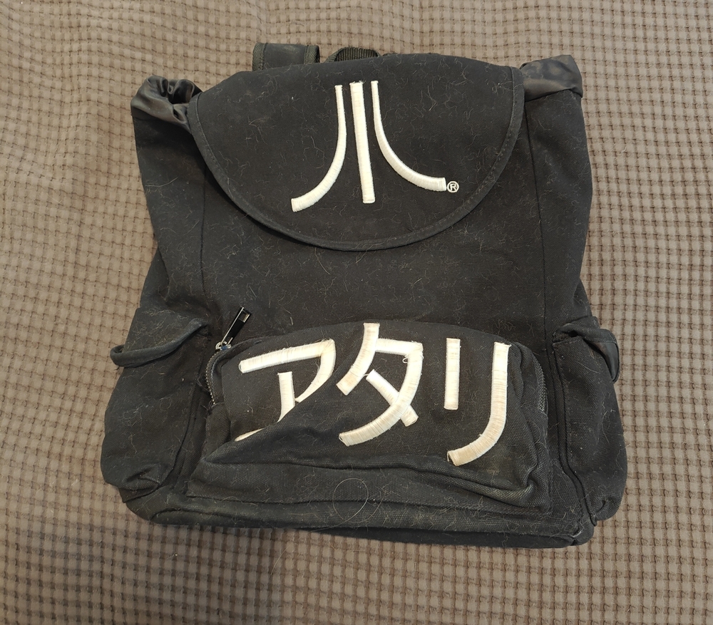 Black Canvas Backpack with White Logo Accent